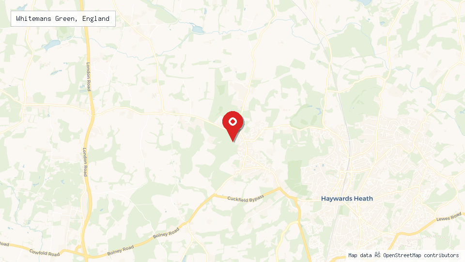 Street map of Whitemans Green, England with location pin