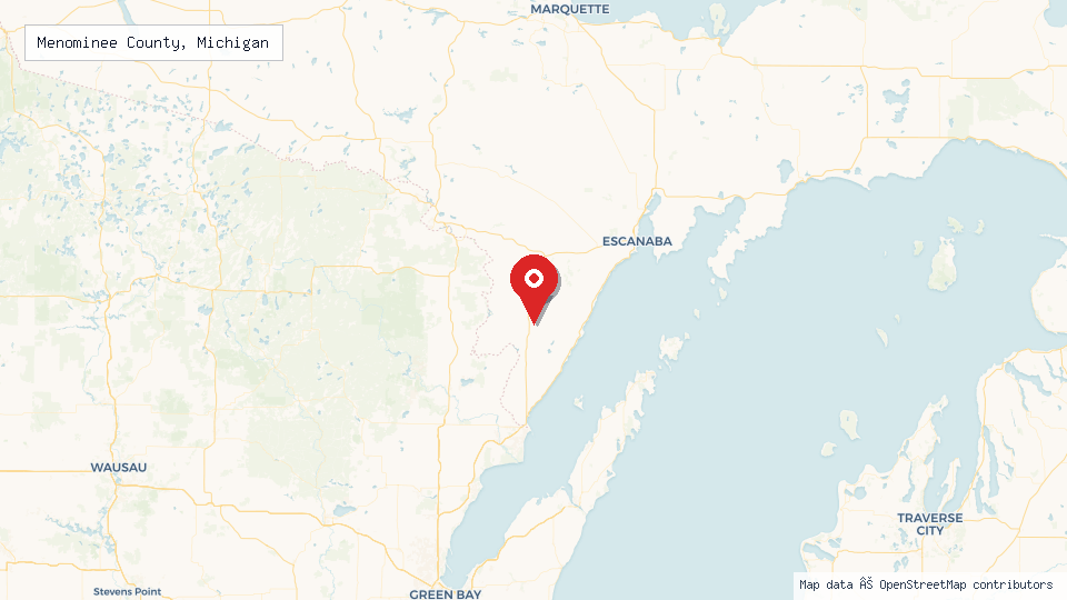 Street map of Menominee County, Michigan with location pin